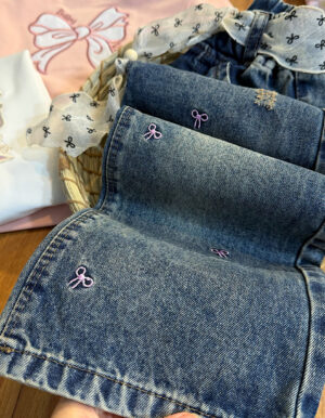 شلوار جین پاپیون صورتی با کمربند